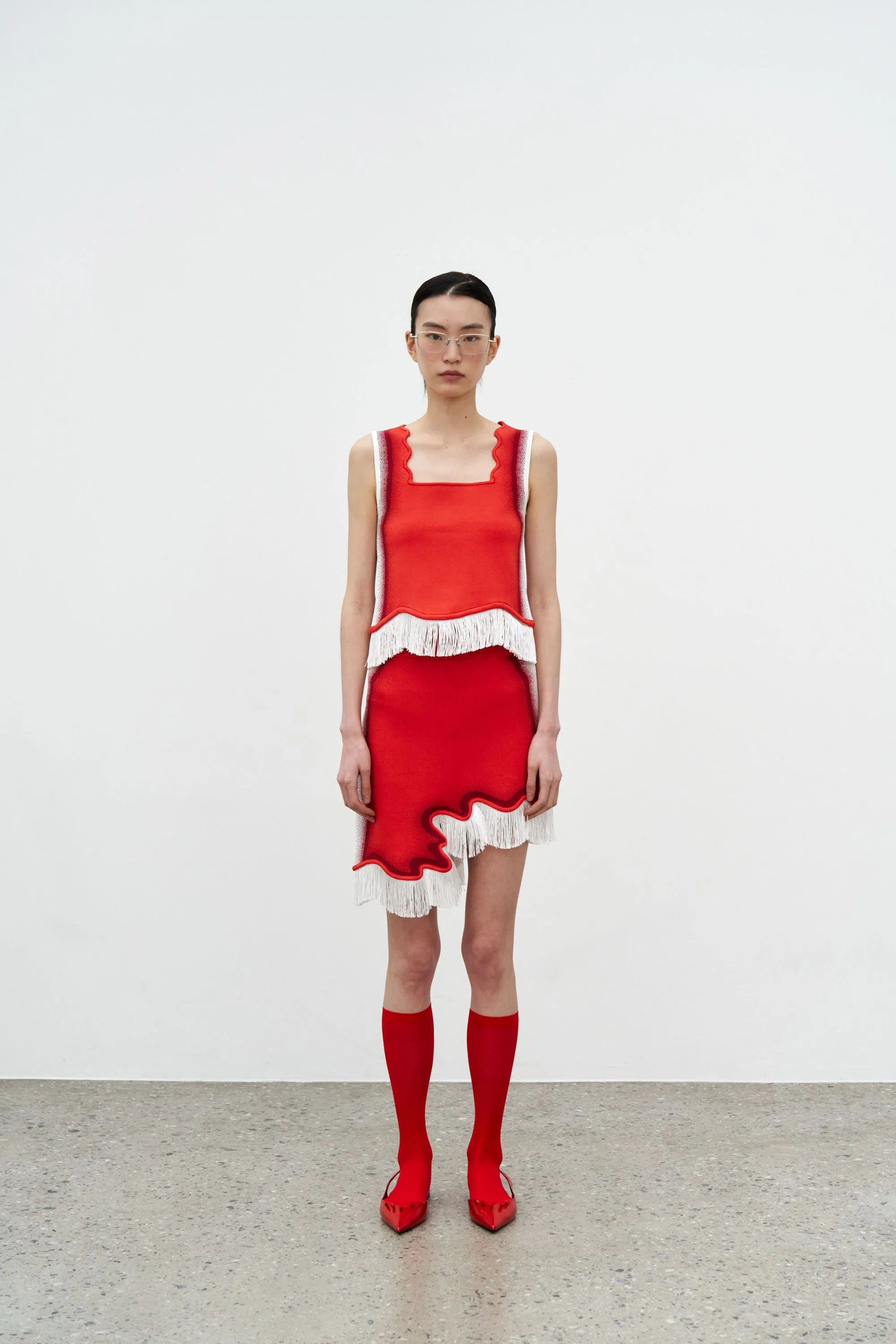 AdjustableNeckline Layered Ventilation Zones EMMA WAVY CROP TANK TOP WITH FRINGE