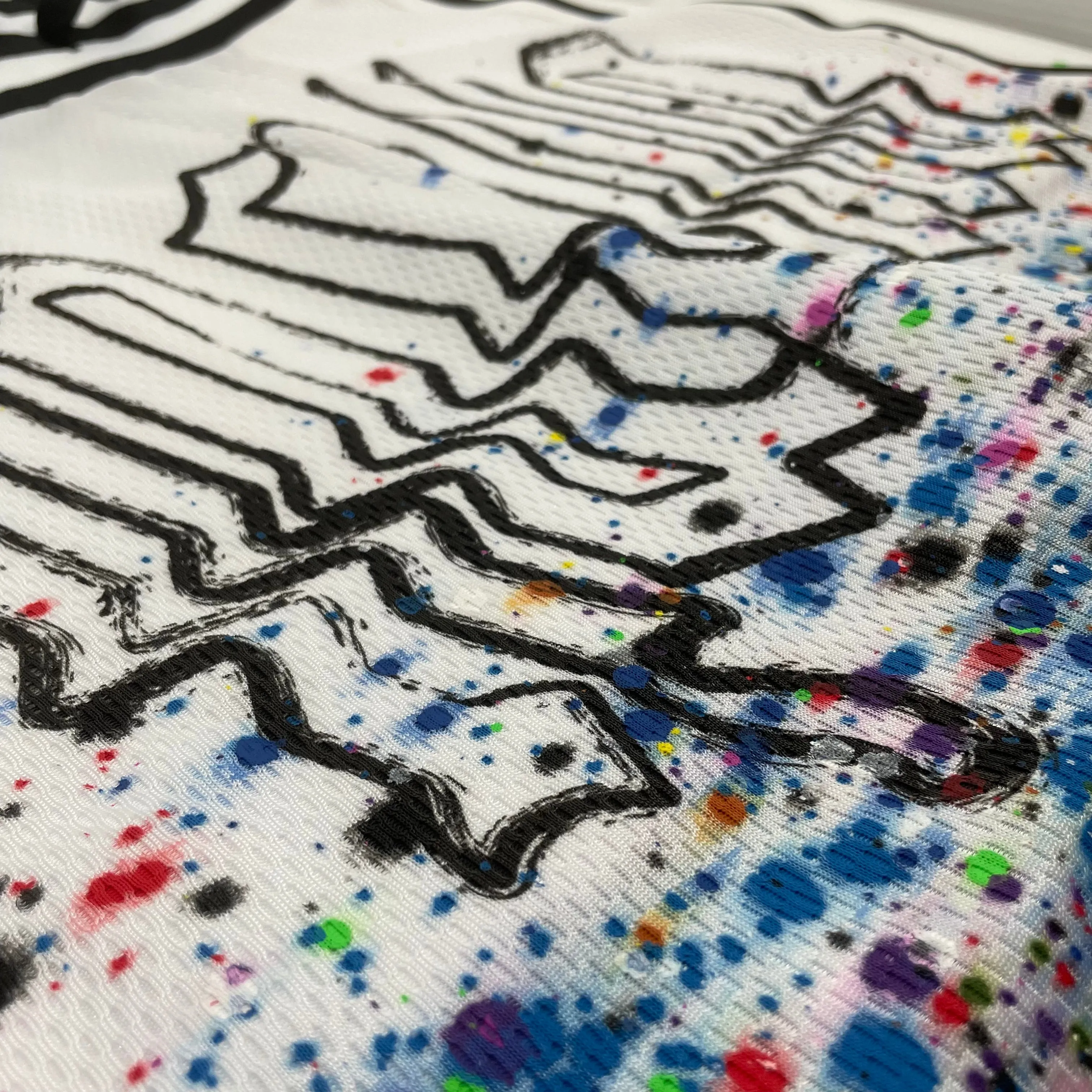 SMOTHERED IN PAINT BASKETBALL SHORT Anti Static Technology