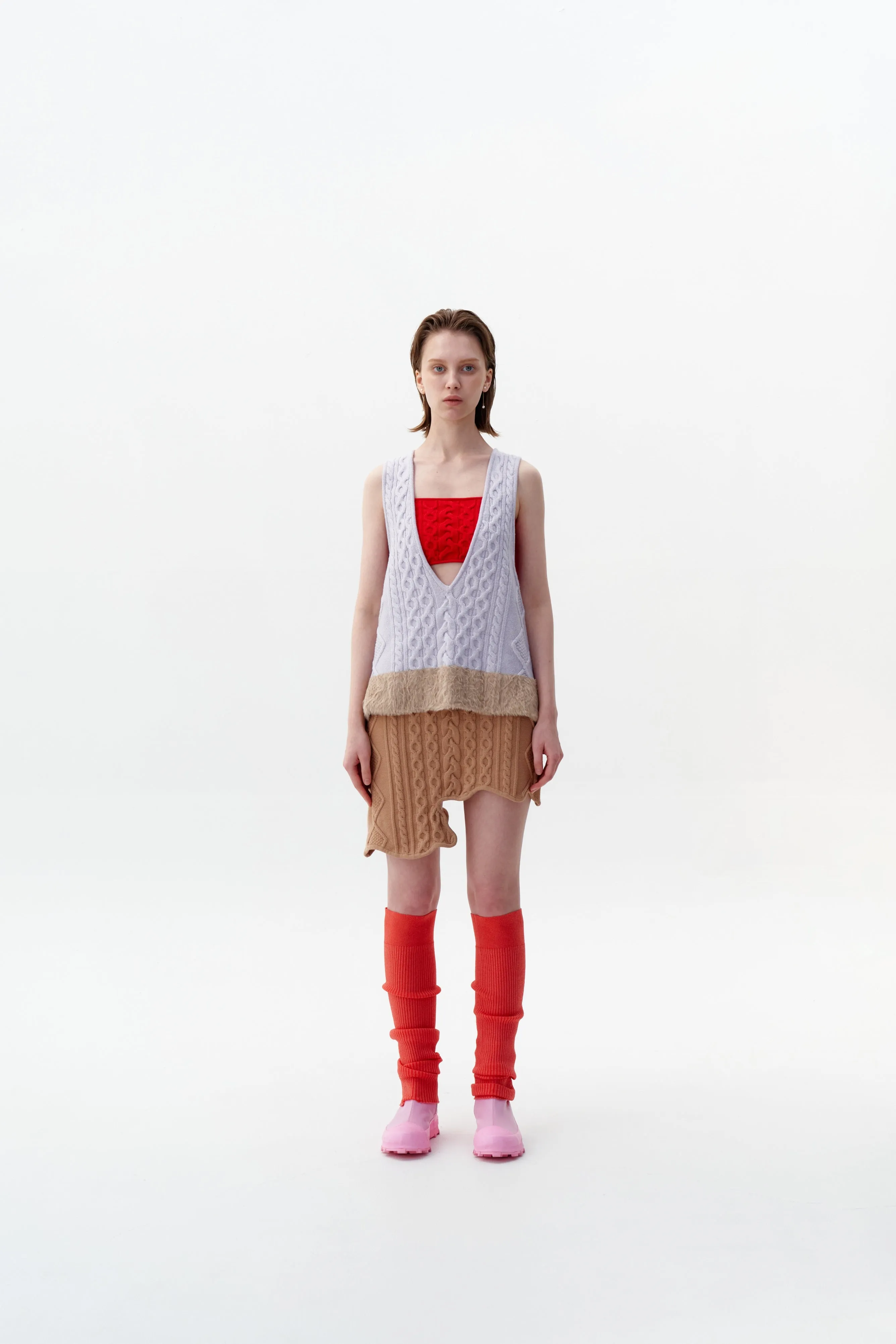 KEPLER MIXED CABLE KNIT VEST Reflective accents