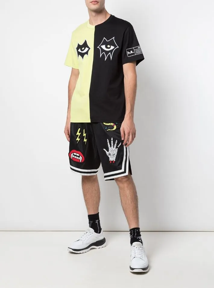 SPLIT IN HALF SIGNATURE EYES TEE BLACK/YELLOW Odor-resistant anniversary
